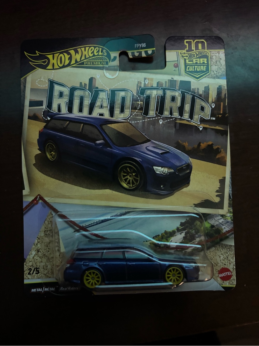 Hot Wheels Road Trip Blue Wagon Toy Car with Yellow Wheels